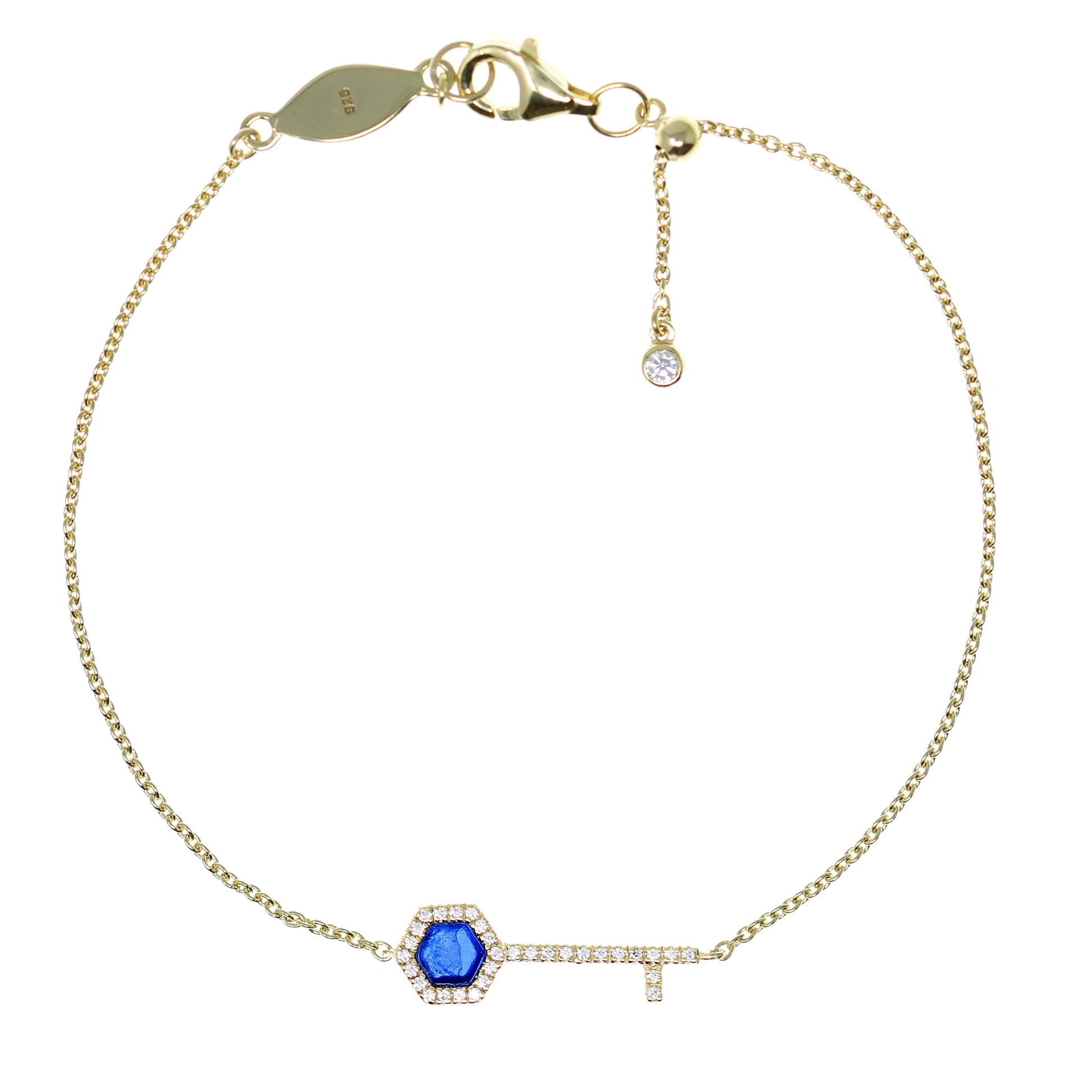
Gold-plated silver chain bracelet with key-shaped blue stone pendant and adjustable slider ball.

