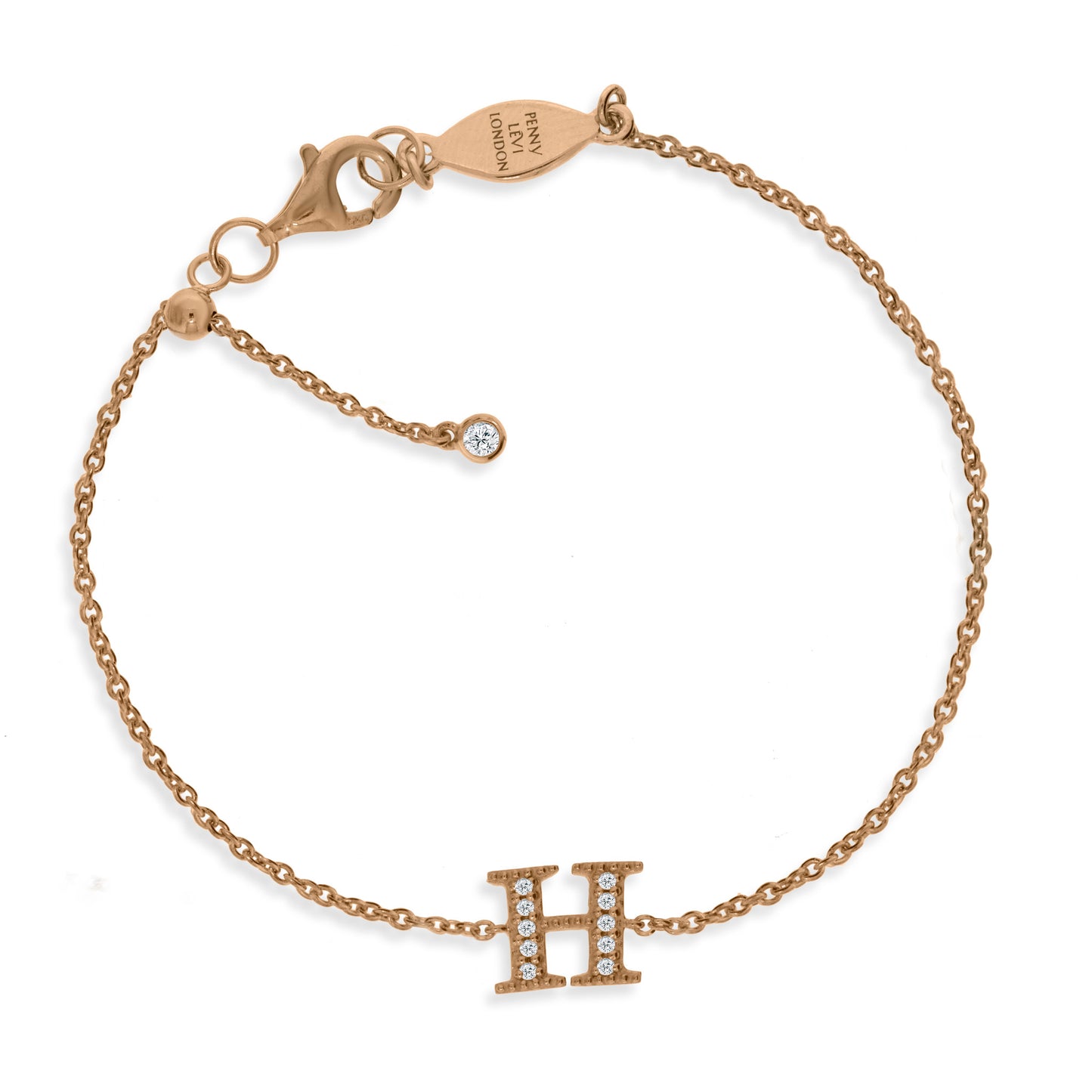 
Rose gold plated initial bracelet with cubic zirconia on a silver chain with adjustable sliding size adapter.

