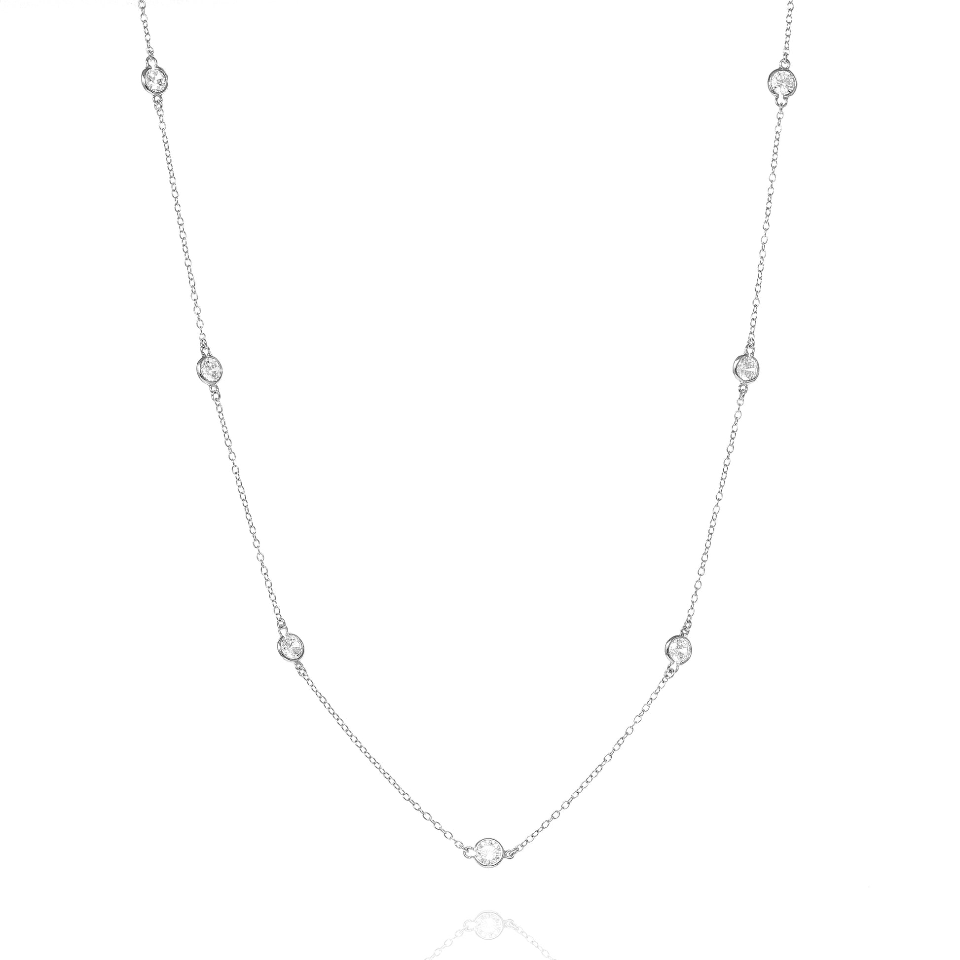 

Sterling silver long chain necklace with bevel set cubic zirconia stones.

