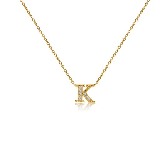 
Gold plated on silver initial necklace with CZ decoration, featuring the letter 'K' on a fine linked chain and a sliding length adjuster.

