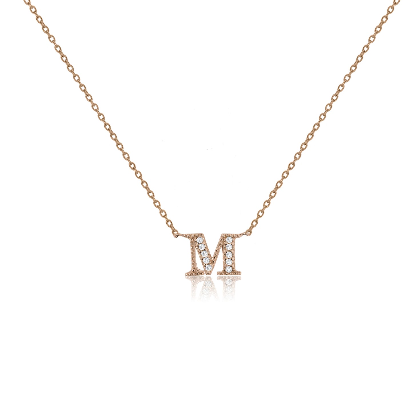 
Rose gold plated on silver initial necklace with cubic zirconia decorations and adjustable sliding length.

