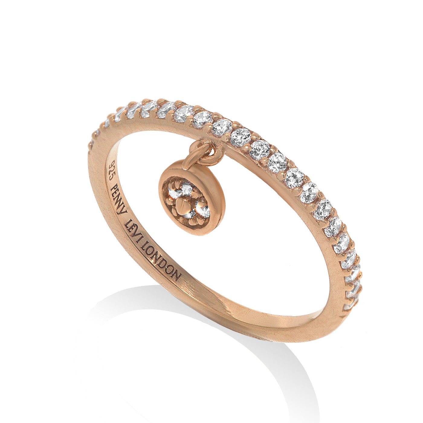 
Gold plated on silver single band pave ring with small hanging disk.

