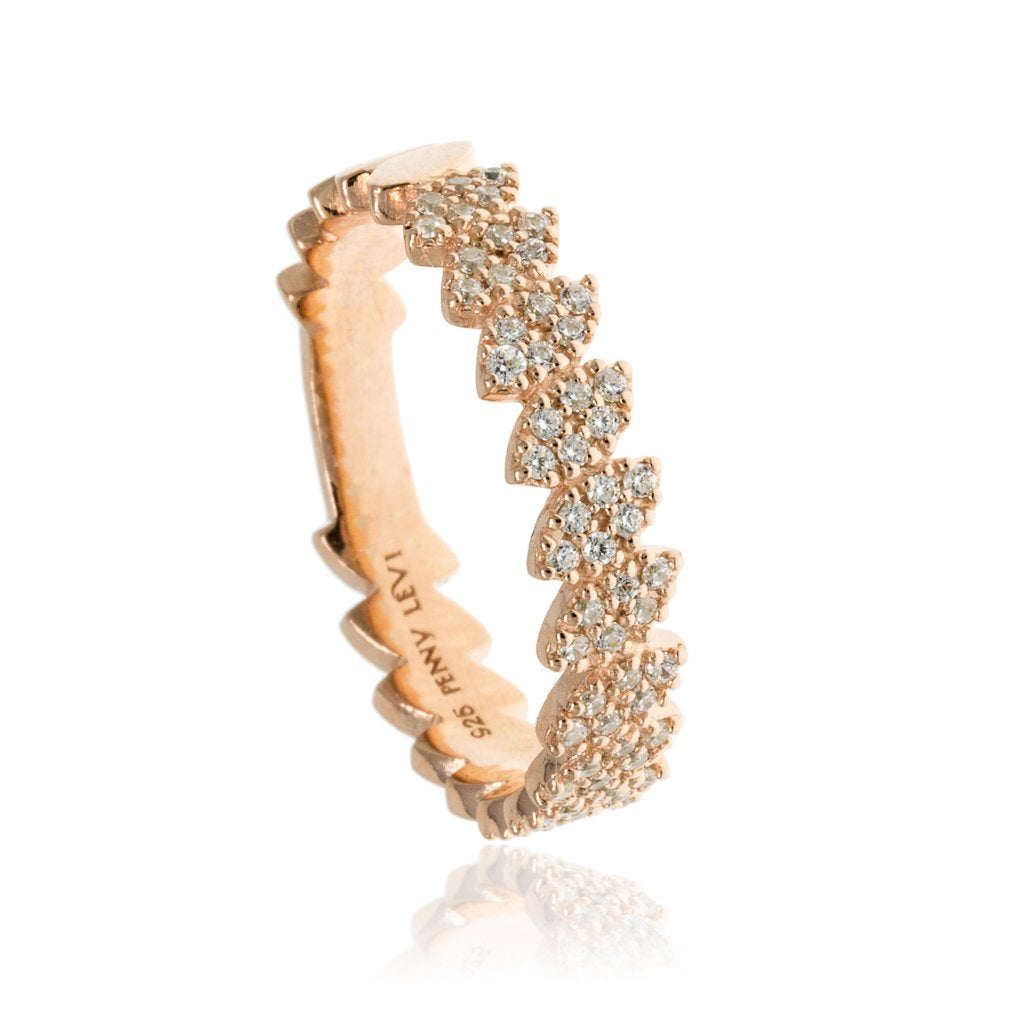 
Gold plated sterling silver pave ring with cubic zirconia stones in a unique design.

